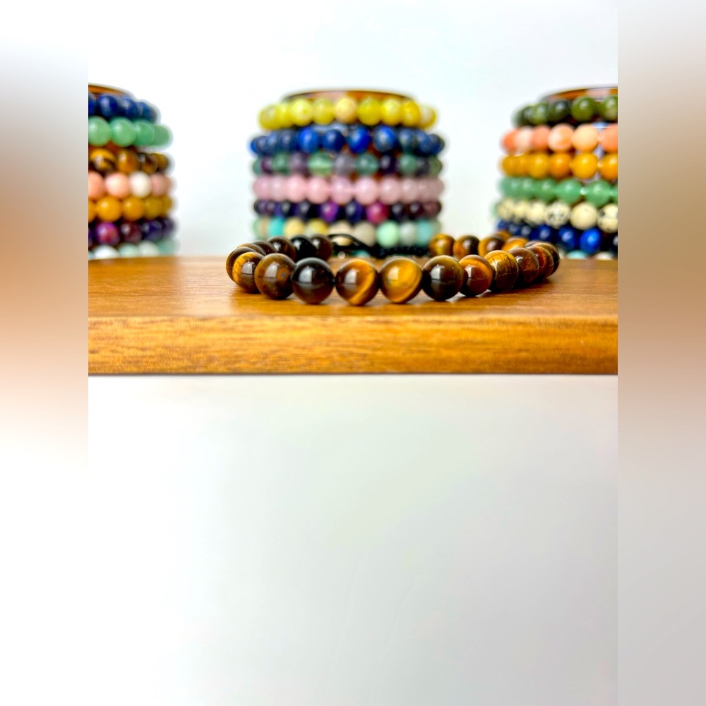 Handmade genuine gemstone bracelet. This Tiger’s Eye bracelet is adjustable.